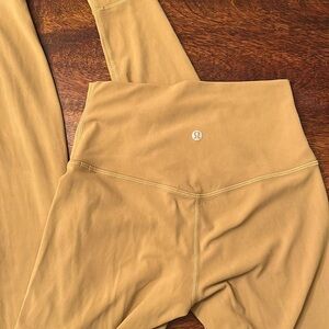 Lululemon gold leggings worn once excellent condition size 4